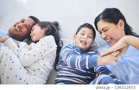 Family, laughing and play with fun and smile in a home with bonding and parent care. Happy, house and mother with father and young children together with comedy in the morning with mom, dad and kids Family, laughing and play with fun and smile in a home with bonding and parent care. Happy, house and mother with father and young children together with comedy in the morning with mom, dad and kids 136312653