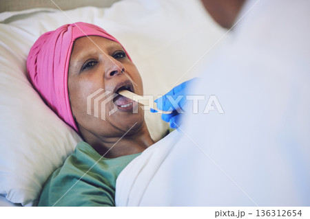 Throat stick, cancer and patient in bed with cold, flu or respiratory illness at her home. Sick, medical and woman at a doctor consultation or checkup for infection or disease in clinic or hospital. 136312654