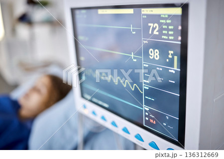 Healthcare, monitor and heart rate in the hospital with a patient in recovery or in preparation of surgery. Medical, technology and cardiology with a person in the clinic for emergency medicare Healthcare, monitor and heart rate in the hospital with a patient in recovery or in preparation of surgery. Medical, technology and cardiology with a person in the clinic for emergency medicare 136312669