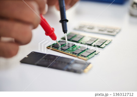 Hands, motherboard and engineer solder circuit board for technology, electrical hardware or CPU microchip. Closeup, technician and iron welding tools for IT maintenance, upgrade or test semiconductor 136312712