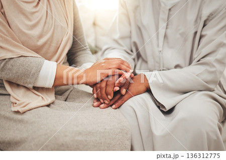 Muslim couple, hands together for support and empathy with care and love, solidarity and trust in relationship. Help, comfort and bonding with commitment in Islam, people in marriage with respect 136312775