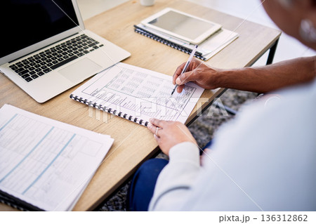 Couple, tax documents and hands with writing, financial review and planning for budget in home. People, laptop and paperwork for insurance, compliance or payment for bills, debt or savings at desk Couple, tax documents and hands with writing, financial review and planning for budget in home. People, laptop and paperwork for insurance, compliance or payment for bills, debt or savings at desk 136312862