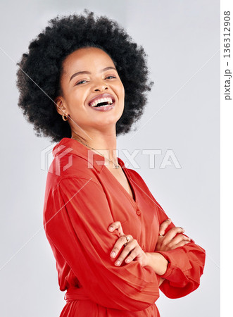 Portrait, fashion and arms crossed with an afro black woman in studio on a white background for trendy style. Smile, confident and red with a happy young female model posing in a clothes outfit Portrait, fashion and arms crossed with an afro black woman in studio on a white background for trendy style. Smile, confident and red with a happy young female model posing in a clothes outfit 136312908