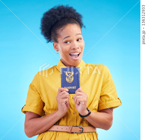 African woman, passport and studio with smile, thinking or wow for compliance, identity or travel by blue background. Happy student girl, surprise and ideas for immigration document in South Africa African woman, passport and studio with smile, thinking or wow for compliance, identity or travel by blue background. Happy student girl, surprise and ideas for immigration document in South Africa 136312933