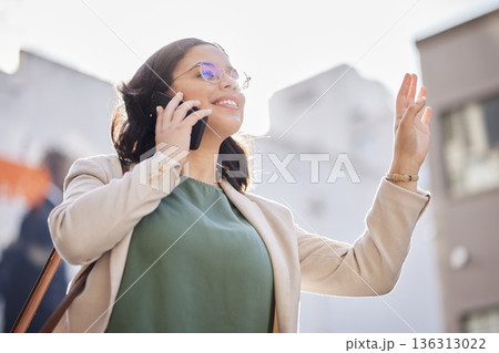 Business, woman and wave for taxi and phone call, talking in the city and outdoor travel to office building on public transport. Happy, waving and person speaking on mobile and calling for a cab Business, woman and wave for taxi and phone call, talking in the city and outdoor travel to office building on public transport. Happy, waving and person speaking on mobile and calling for a cab 136313022