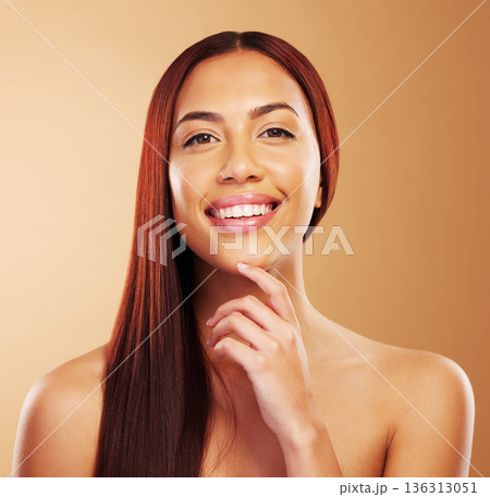 Hair care, beauty and portrait of woman with smile, hand on skin and luxury salon treatment on brown background. Aesthetic, haircut and haircare, happy face of model in cosmetics and makeup in studio 136313051