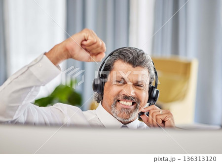 Call centre, celebrate and a happy man at a computer with success, achievement or bonus win. Mature male consultant or agent with fist for customer service, help desk and crm or telemarketing target Call centre, celebrate and a happy man at a computer with success, achievement or bonus win. Mature male consultant or agent with fist for customer service, help desk and crm or telemarketing target 136313120