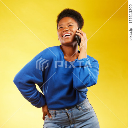 Happy, phone call and black woman in studio laugh, silly or share joke on yellow background. Funny, talking and African lady with goofy, gossip or conversation on smartphone for online communication Happy, phone call and black woman in studio laugh, silly or share joke on yellow background. Funny, talking and African lady with goofy, gossip or conversation on smartphone for online communication 136313200