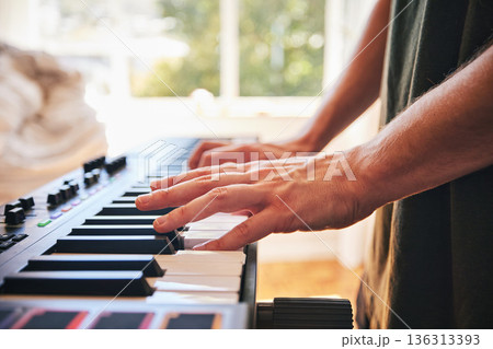 Piano, man and hands on keys for music, creative talent and skills in home studio. Closeup, musician and playing synthesizer keyboard for audio performance, sound artist and learning instrument notes 136313393