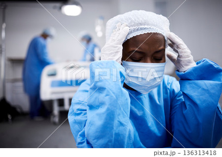 Black woman, stress or sad surgeon in surgery grieving after loss, operation failure or bad news in hospital. Depression, mask or upset doctor thinking with anxiety thinking of operating room mistake Black woman, stress or sad surgeon in surgery grieving after loss, operation failure or bad news in hospital. Depression, mask or upset doctor thinking with anxiety thinking of operating room mistake 136313418