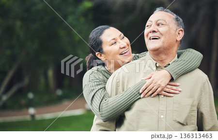 Love, happy and senior couple hugging in nature in outdoor park with care, happiness and romance. Smile, sweet and elderly man and woman in retirement embracing and bonding together in green garden. Love, happy and senior couple hugging in nature in outdoor park with care, happiness and romance. Smile, sweet and elderly man and woman in retirement embracing and bonding together in green garden. 136313463