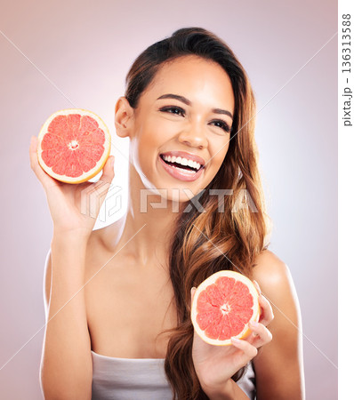Citrus, grapefruit and happy woman with beauty, natural or organic wellness isolated in a brown studio background. Excited, healthy and young female person with vitamin c for skincare or detox Citrus, grapefruit and happy woman with beauty, natural or organic wellness isolated in a brown studio background. Excited, healthy and young female person with vitamin c for skincare or detox 136313588