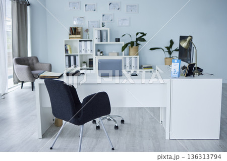 Empty, office of medical doctor and consultation with furniture, table or professional layout of hospital interior. Background, consulting room or workplace in healthcare, surgery and wellness clinic Empty, office of medical doctor and consultation with furniture, table or professional layout of hospital interior. Background, consulting room or workplace in healthcare, surgery and wellness clinic 136313794