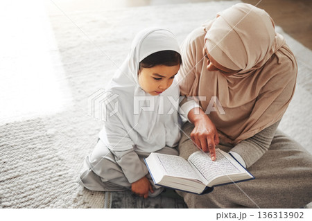 Quran, Islamic and mother and child prayer to Allah, god or holy spirit for Arabic religion, faith and learning to pray. Spiritual worship book, home Muslim family and praying mom teaching young kid 136313902