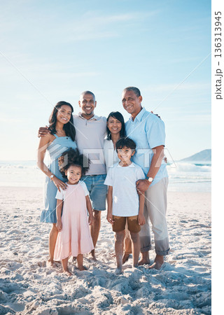 Beach, happy and portrait of a big family on a vacation, adventure or weekend trip for summer. Smile, bonding and children by the ocean with their parents and grandparents on tropical travel holiday. 136313945