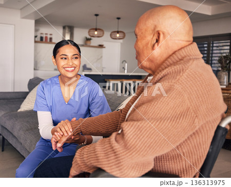Happy woman, nursing home and support man with disability in wheelchair for medical trust, advice and wellness. Nurse, caregiver and holding hands of patient for rehabilitation, helping or consulting Happy woman, nursing home and support man with disability in wheelchair for medical trust, advice and wellness. Nurse, caregiver and holding hands of patient for rehabilitation, helping or consulting 136313975