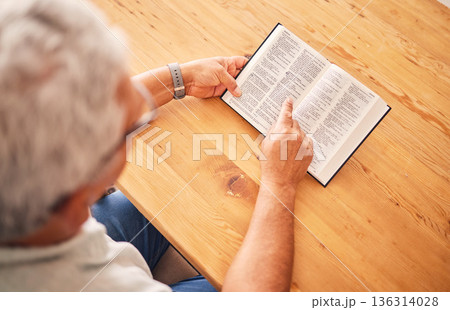 Above, reading book or old man with holy bible for worship, support or hope in Christianity faith in retirement. Jesus, God or senior person studying or learning gospel prayer in spiritual religion Above, reading book or old man with holy bible for worship, support or hope in Christianity faith in retirement. Jesus, God or senior person studying or learning gospel prayer in spiritual religion 136314028