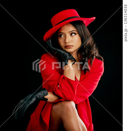 Woman, retro red fashion and glamour in studio with vintage beauty and wealth. Young female person, black background and luxury style with cosmetics, designer rich clothes and model with confidence Woman, retro red fashion and glamour in studio with vintage beauty and wealth. Young female person, black background and luxury style with cosmetics, designer rich clothes and model with confidence 136314038