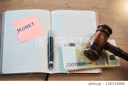 Bribe, corruption and law with notebook and money for deal, justice and illegal payment from above. Judge, crime and fraud with gavel and euro cash in court room for lawyer, agreement and tax 136314066