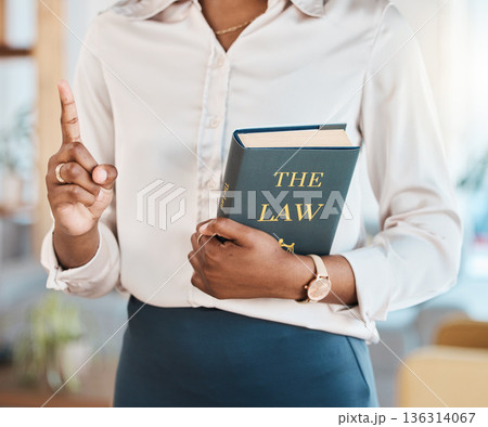 Legal, lawyer and book with hands of black woman in office for advocate, justice and consultant. Attorney, advisor and study with closeup of person in law firm for knowledge, expert and government Legal, lawyer and book with hands of black woman in office for advocate, justice and consultant. Attorney, advisor and study with closeup of person in law firm for knowledge, expert and government 136314067