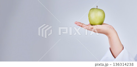 Mockup apple, hand and banner for diet marketing, health promotion or advertising nutrition. Space, wellness and person with a fruit or food for detox or vegan balance isolated on a white background 136314238