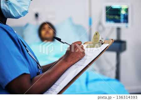 Hands, healthcare and a nurse writing on documents in a hospital during a patient checkup or report. Medical, insurance and information with a black woman medicine professional in a clinic closeup Hands, healthcare and a nurse writing on documents in a hospital during a patient checkup or report. Medical, insurance and information with a black woman medicine professional in a clinic closeup 136314393