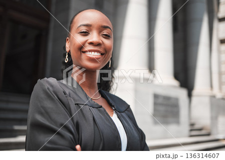 Happy, black woman or portrait lawyer with confidence, empowerment or justice outside court. Face, empowerment or proud African attorney with leadership, arms crossed or vision for legal agency 136314607