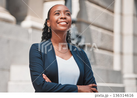 Arms crossed, happy black woman or lawyer thinking with smile or confidence working in a law firm. Court, empowerment or proud African attorney with leadership, ideas or vision for legal agency 136314616