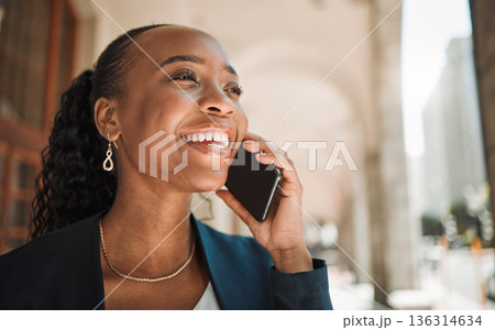 Thinking, talking and a black woman on a phone call, laughing and in communication in the city. Smile, idea and an African girl or employee speaking on a mobile for a chat, conversation or discussion 136314634