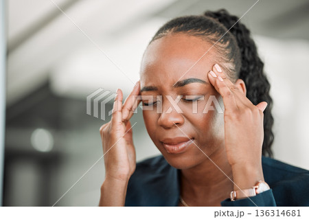 Stress, head pain or black woman in office with headache due to burnout or fatigue from deadline. Migraine, crisis or tired African female consultant depressed or frustrated by anxiety in workplace 136314681