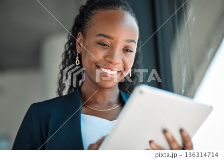 Happy, lawyer and black woman with tablet in office for legal research, web app and online social media. African attorney, technology and professional reading business email, networking or internet. Happy, lawyer and black woman with tablet in office for legal research, web app and online social media. African attorney, technology and professional reading business email, networking or internet. 136314714
