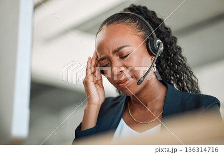 Call center stress, anxiety or black woman with headache pain due to burnout fatigue in a telecom office. Migraine, failure crisis or tired consultant depressed or frustrated by crm or sales deadline Call center stress, anxiety or black woman with headache pain due to burnout fatigue in a telecom office. Migraine, failure crisis or tired consultant depressed or frustrated by crm or sales deadline 136314716