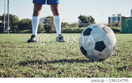Sports, soccer ball and feet or shoes of person to kick on field, fitness training or ready for a goal on grass. Football, sneakers and athlete in exercise, competition or sport challenge for goals Sports, soccer ball and feet or shoes of person to kick on field, fitness training or ready for a goal on grass. Football, sneakers and athlete in exercise, competition or sport challenge for goals 136314795
