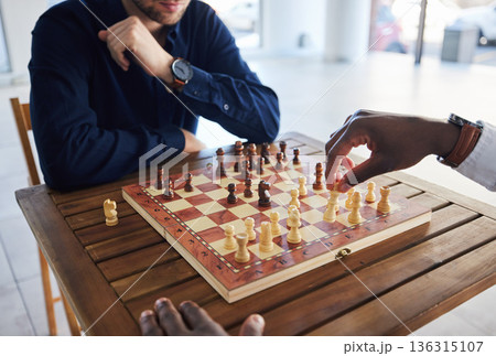 Hands, competition and people with a chess game, strategy and playing together for fun. Table, professional and friends with a board for gaming, learning and expert with a skill or hobby in a room Hands, competition and people with a chess game, strategy and playing together for fun. Table, professional and friends with a board for gaming, learning and expert with a skill or hobby in a room 136315107