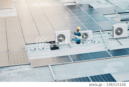 Engineer woman, speaker call and phone in construction, solar energy and maintenance for air conditioner on rooftop. Technician, photovoltaic tech and hvac on roof, building and electricity in city 136315108