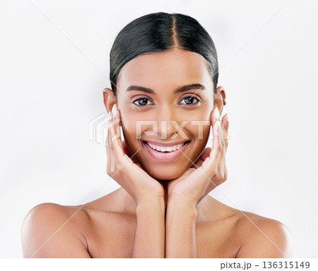 Skin, beauty and face portrait of happy woman with natural glow isolated on a white background. Dermatology, makeup and cosmetics of Indian female model for facial shine, smile or self care in studio Skin, beauty and face portrait of happy woman with natural glow isolated on a white background. Dermatology, makeup and cosmetics of Indian female model for facial shine, smile or self care in studio 136315149