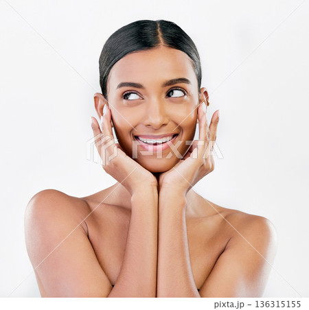 Face, thinking and a woman with natural beauty, skin or glow isolated on a white background. Dermatology, makeup and cosmetics of Indian female model for facial shine, wellness or self care in studio 136315155