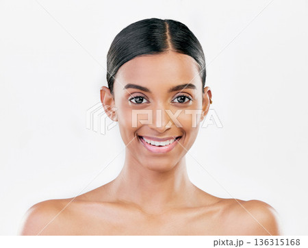 Beauty, face and portrait a happy woman with natural skin care isolated on a white background. Dermatology, makeup glow and cosmetics with Indian female model for facial shine and self love in studio Beauty, face and portrait a happy woman with natural skin care isolated on a white background. Dermatology, makeup glow and cosmetics with Indian female model for facial shine and self love in studio 136315168
