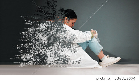 Sad, mental health and woman with depression or thinking of anxiety, problem or frustrated. Fading, depressed and a young person or girl sitting with grief, psychosis or fail on a dark background Sad, mental health and woman with depression or thinking of anxiety, problem or frustrated. Fading, depressed and a young person or girl sitting with grief, psychosis or fail on a dark background 136315674