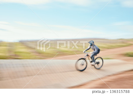 Motorbike, speed and freedom in desert with adventure for sport in competition or blur. Race, dirt bike and action with energy in outdoor for training or rally performance with power in mockup space. 136315788