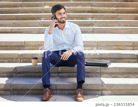 Business, stairs and man with a smile, phone call and relax on lunch break, conversation and network. Male person, consultant or agent with a smartphone, steps or connection with happiness or talking Business, stairs and man with a smile, phone call and relax on lunch break, conversation and network. Male person, consultant or agent with a smartphone, steps or connection with happiness or talking 136315854