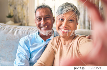 Selfie, home and senior couple with love, relax and happiness with romance, bonding and marriage. Portrait, old man and elderly woman on a couch, social media and profile picture with a relationship Selfie, home and senior couple with love, relax and happiness with romance, bonding and marriage. Portrait, old man and elderly woman on a couch, social media and profile picture with a relationship 136315936