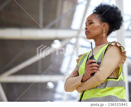 Woman, construction and walkie talkie at worksite for project with inspection at building with planning. Architect, girl and radio for contractor or leadership and worker with technology or ideas. Woman, construction and walkie talkie at worksite for project with inspection at building with planning. Architect, girl and radio for contractor or leadership and worker with technology or ideas. 136315941