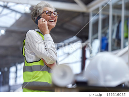 Phone call, senior woman and architect in funny conversation, planning and work on construction project. Elderly engineer, mobile and manager speaking to contact, communication and laugh in industry. Phone call, senior woman and architect in funny conversation, planning and work on construction project. Elderly engineer, mobile and manager speaking to contact, communication and laugh in industry. 136316085