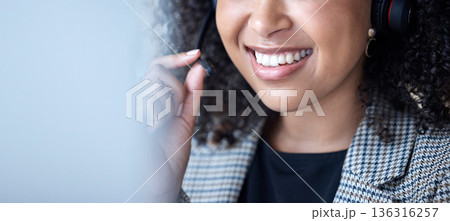 Call center, woman and mouth talking for communication, customer service and CRM at computer with mockup space. Closeup, face and happy agent with microphone for telemarketing, consulting and support Call center, woman and mouth talking for communication, customer service and CRM at computer with mockup space. Closeup, face and happy agent with microphone for telemarketing, consulting and support 136316257
