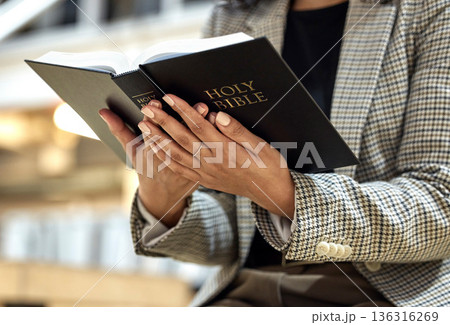 Hands, bible and person with reading, religion and faith with knowledge, learning and studying God. Priest, book and focus for spiritual wisdom, information and mindset for Christianity with peace Hands, bible and person with reading, religion and faith with knowledge, learning and studying God. Priest, book and focus for spiritual wisdom, information and mindset for Christianity with peace 136316269