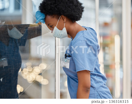 Surgeon, mental health pain and black woman sad after medicine fail, hospital crisis or nurse mistake. Face mask, burnout fatigue or African female doctor tired after medical risk, anxiety or service 136316315