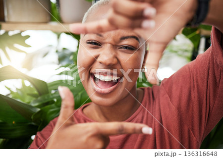 Black woman, portrait and hands in frame of face for selfie memory, vlog or social media in garden. Happy African female person with smile for photo, picture or capture moment in natural back yard Black woman, portrait and hands in frame of face for selfie memory, vlog or social media in garden. Happy African female person with smile for photo, picture or capture moment in natural back yard 136316648