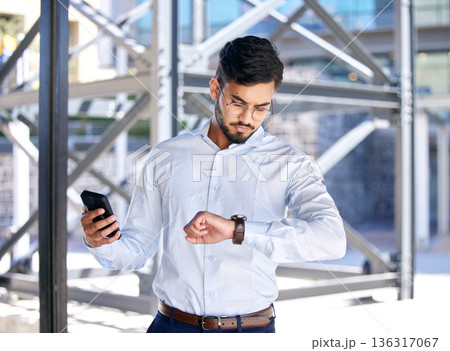 Business, outdoor and man with a smartphone, check time and schedule with a consultant, punctual and internet connection. Male person, employee outside or agent with a cellphone, watch or appointment Business, outdoor and man with a smartphone, check time and schedule with a consultant, punctual and internet connection. Male person, employee outside or agent with a cellphone, watch or appointment 136317067
