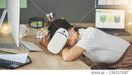Tired, virtual reality or businesswoman in office sleeping in metaverse with digital technology for nap. Relax, fatigue or overworked worker with futuristic headset for 3d fantasy vr simulation Tired, virtual reality or businesswoman in office sleeping in metaverse with digital technology for nap. Relax, fatigue or overworked worker with futuristic headset for 3d fantasy vr simulation 136317087